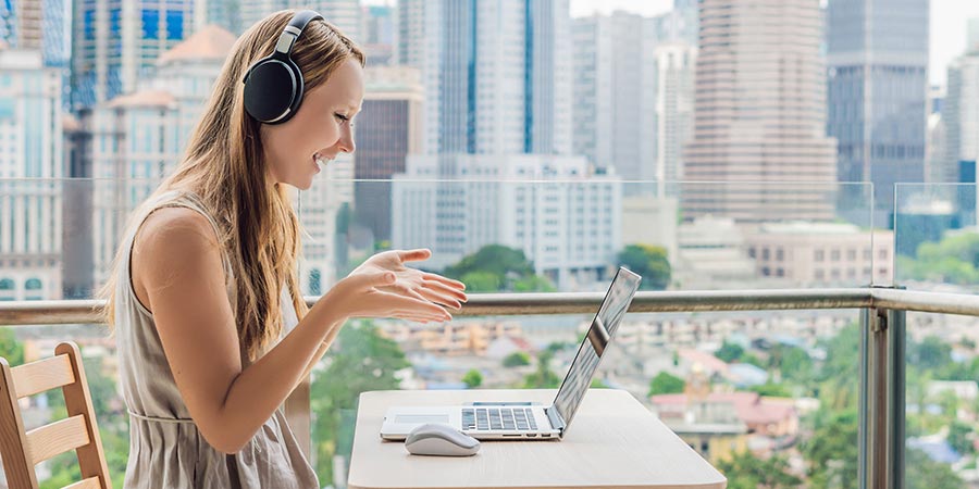 Happy woman working remotely