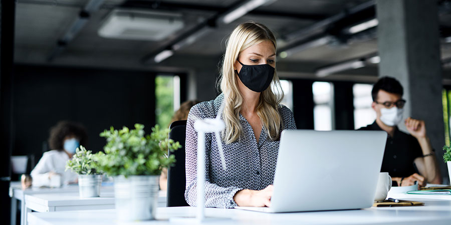 Female Worker Wearing a Protective Mask
